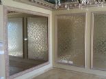 Decoracion con moldura vegetal y de trazado liso..